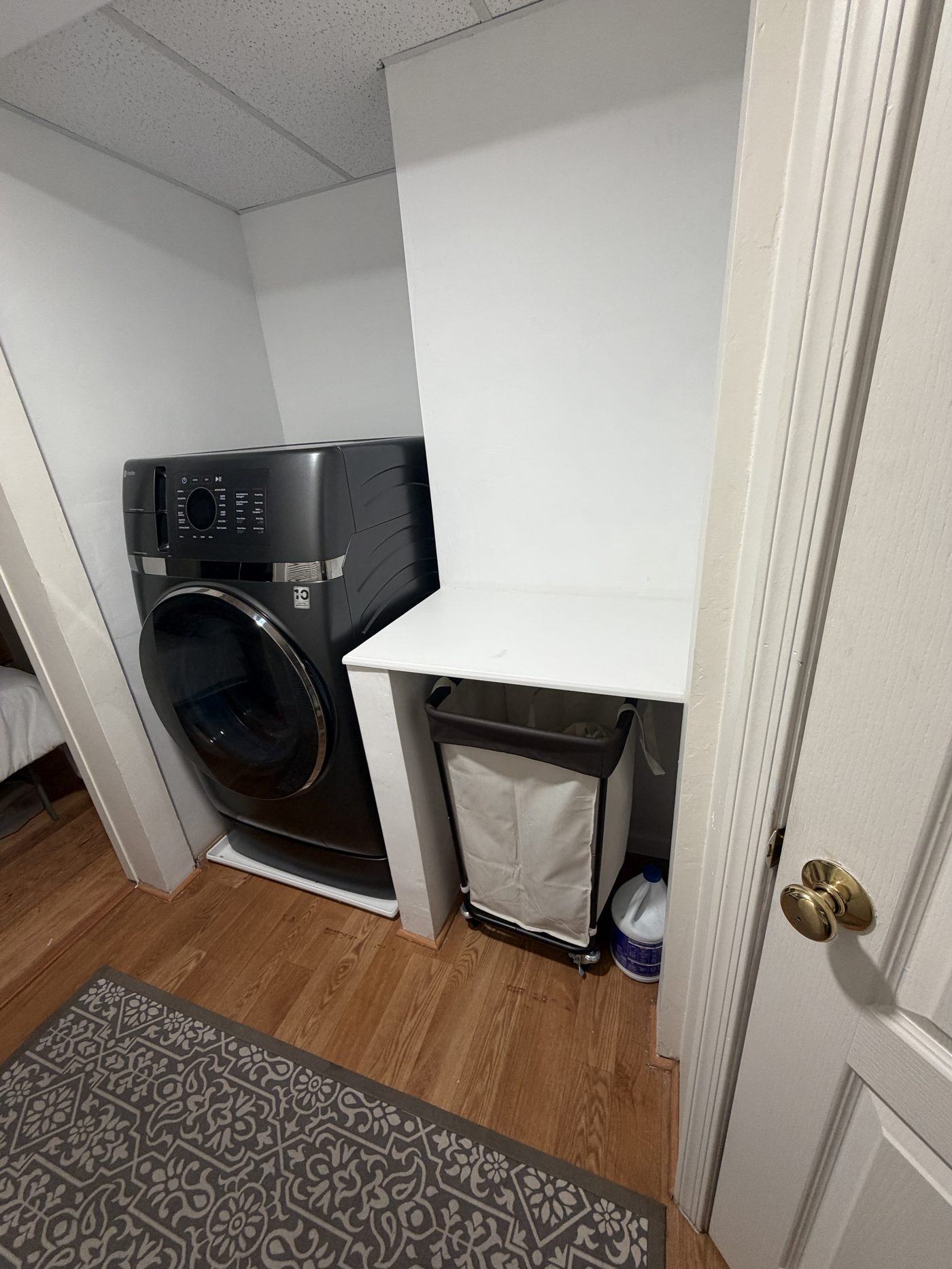Finished laundry nook with compact all-in-one washer/dryer